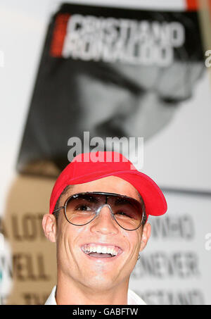 Manchester United's Cristiano Ronaldo with a cut above his eye during a book launch at Old Trafford, Manchester. Stock Photo