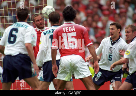 Switzerland's Yvan Quentin clears the ball off the line, watched by (l-r) Gareth Southgate (England), Teddy Sheringham (England), Ramon Vega (Switzerland), Tony Adams (England) and Alan Shearer (England). Stock Photo