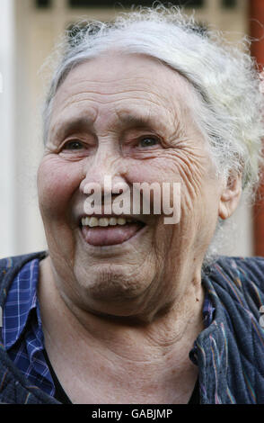 Doris Lessing, author of dozens of works from short stories to science fiction, including the classic 'The Golden Notebook,' speaks to the press outside her home in West Hampstead, north-west London, after it was announced that she had won the Nobel Prize for literature. Stock Photo