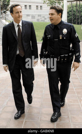 Conservative Party leader David Cameron meets police officers from the LAPD in Los Angeles today. Stock Photo