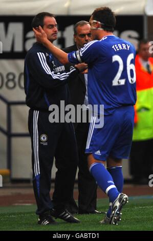 Soccer - Barclays Premier League - Bolton Wanderers v Chelsea - Reebok Stadium. Chelsea's John Terry celebrates with Chelsea assistant manager Steve Clarke Stock Photo