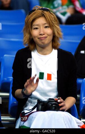 Soccer - FIFA World Cup 2002 - Group E - Germany v Ireland. A Japanese Ireland fan watches the action Stock Photo
