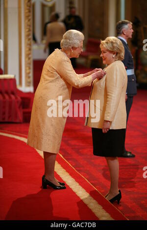 Mrs. Barbara Taylor Bradford, Author, from New York, receives an OBE from The Queen at Buckingham Palace, for services to Literature. Stock Photo