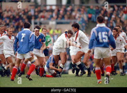 Rugby Union - Five Nations - Twickenham - England v France. England's Martin Johnson gives support to Ben Clarke Stock Photo