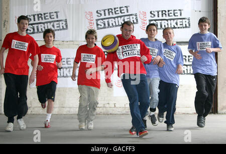 Manchester United and England's Wayne Rooney meets winners of the Coca-Cola street striker competition at Towngate Business Centre, Walkden, Manchester. Stock Photo