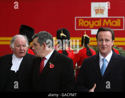 Britain's Prime Minister Gordon Brown chats to the speaker of the House of Commons Michael Martin as the leader of the opposition David Cameron looks on with the back-drop of a Royal Mail lorry, shortly before the unveiling of a statue by the Prince of Wales of David Lloyd George in Parliament Square, Westminster, London. Stock Photo