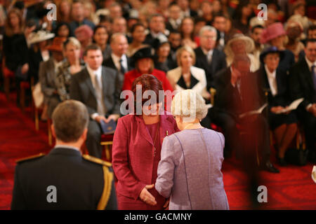 Denise Marshall, from London, is made an OBE by The Queen at Buckingham Palace. Stock Photo