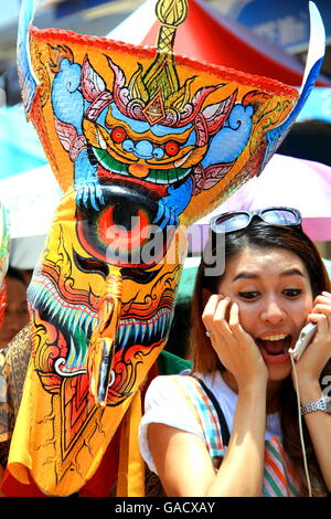 Thai woman in traditional dress during Phi Ta Kon festival. Dansai