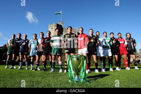 Left to right Bob Casey (London Irish), Alastair kellock (Glasgow Warriors), Matt Salter (Bristol), Xavier Rush (Cardiff Blues), Paul Volley (Harlequins), Neil de Kock (Saracens), Harry Ellis (Leicester Tigers), Tom Voyce (London Wasps), Matthew Watkins (Llanelli Scarlets), Kevin Morgan (Newport Gwent Dragons), Kaine Robertson (Viadana), Silvio Orlando (Benetton Treviso), Allister Hogg (Edinburgh), Marco Bortolami (Gloucester) and Ryan Jones (Ospreys) represent their competing club at the launch of the Heineken Cup as the pose for a picture with the trophy outside at Cardiff Castle, Cardiff. Stock Photo