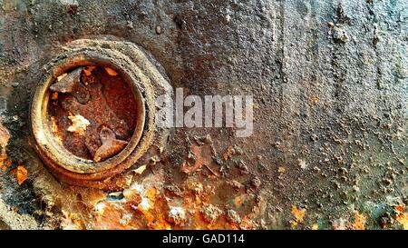 Close up of old rusted and dirty metal oil storage barrel Stock Photo