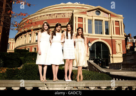 Classical girl group All Angels (left-right) Laura Wright, Charlotte Ritchie, Daisy Chute & Melanie Nakhla highlighting Universal Music Group's decision to remove copy protection across it's entire Classics & Jazz catalogue in a download trial, at Universal's head office in Kensington, west London. Stock Photo