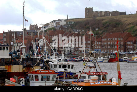 A general view of the fishing port of Whitby which now has just ten fishing trawlers left in its fleet. Stock Photo