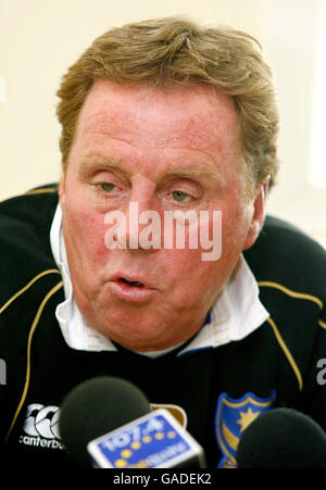 Portsmouth manager Harry Redknapp reads a statement during a news conference at the club's training ground in Eastleigh, Hampshire. Stock Photo