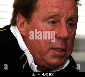 Portsmouth manager Harry Redknapp reads a statement during a news conference at the clubs training ground in Eastleigh, Hampshire. Stock Photo