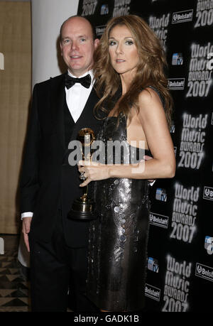 Celine Dion (right), pictured with Prince Albert of Monaco, wins the Legend award during the World Music Awards 2007 at the Sporting Club Casino in Monte Carlo, France. Stock Photo