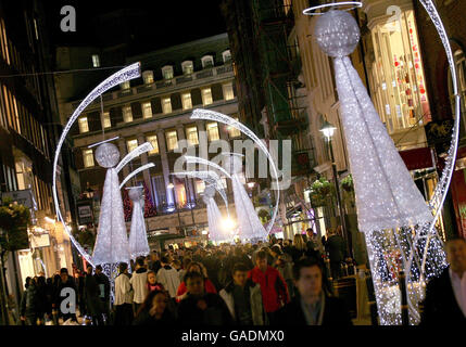 The Christmas Angel Lights switched on by Myleene Klass and Kindred Spirits on South Molton Street in London. Stock Photo