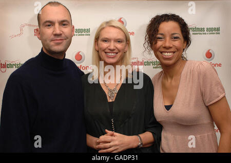 Capital Radio DJ's Johnny Vaughan (left) and Margherita Taylor (right) pictured with Anneka Rice, project manager of Help a London Child, launches Capital FM's Capital Christmas Appeal in Leicester Square, central London, to help Capital Radio build a new wing of the Shooting Star Children's Hospice. Stock Photo