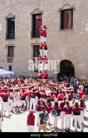 BARCELONA, SPAIN - JUNE 26, 2016: Castellers group of people that build human castles on June 26, 2016 in Barcelona. Stock Photo