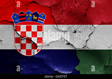 flags of Croatia and Hungary painted on cracked wall Stock Photo