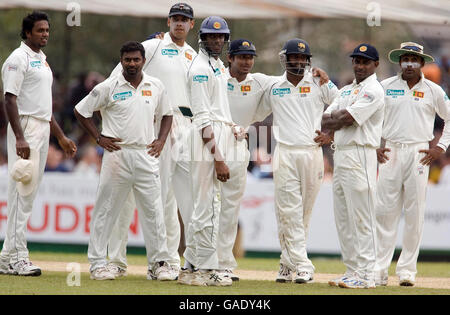 The Sri Lankan wait for a replay during the First Test at the Asgiriya International Stadium, Kandy, Sri Lanka. Stock Photo