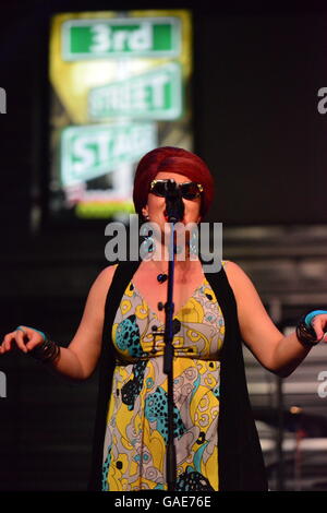 Female lead singer on stage at Fremont street in Las Vegas Stock Photo