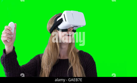 Woman using VR headset Stock Photo