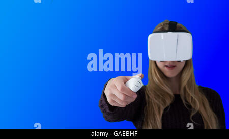 Woman using VR headset Stock Photo