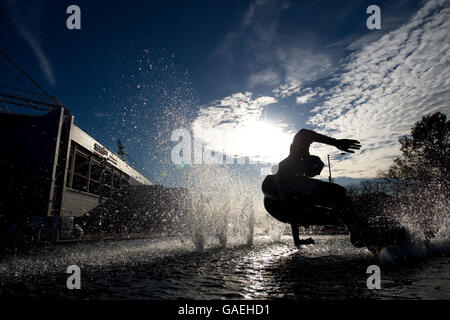 Soccer - Memorabilia at the Football Museum - Deepdale. A statue of Preston North End's Tom Finney splashing through a puddle on show outside the National Football Museum Stock Photo