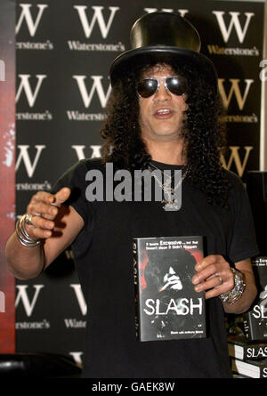 Former Guns N' Roses guitarist Slash signs copies of his autobiography 'Slash' at Waterstone's in Piccadilly, London. Stock Photo