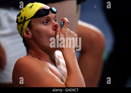 Manchester 2002 - Commonwealth Games - Swimming - Mens 50m Breaststroke Semi Final. Australia's Robert van Der Zant uses his asthma inhaler during the warm up before his 50m Breaststroke Semi Final Stock Photo