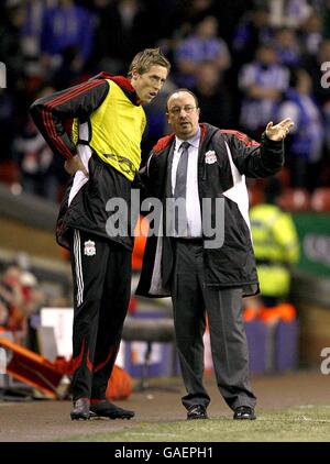 Soccer - UEFA Champions League - Group A - Liverpool v FC Porto - Anfield. Liverpool manager Rafael Benitez gives Peter Crouch instruction on the touchline. Stock Photo