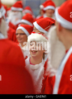 Competitors take part in the 2007 Liverpool Santa Dash, a 5K charity run around the city. Stock Photo