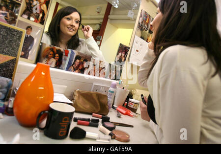 Orange 'Wannabe Wicked' competition winner Louise Henderson, from Newcastle, applies her make-up before taking to the stage for a walk-on role in the musical 'Wicked' at the Apollo Theatre, Victoria, London. Stock Photo