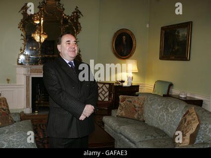 First Minister of Scotland, Alex Salmond, awaits the arrival of the First Minister of Wales, Rhodri Morgan for their first official meeting at Bute House in Edinburgh. Stock Photo