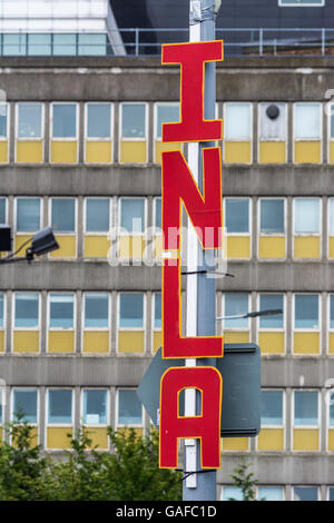 Large INLA lettering on Belfast's Falls Road. Stock Photo