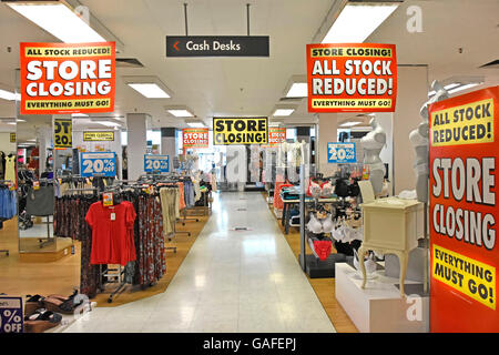 England UK interior BHS store placards for holding closing down sale prior to all UK British Home Stores shut down Stock Photo