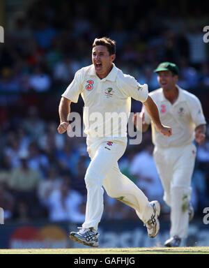 Australia's Brad Hogg celebrates claiming the wicket of India's V.V.S Laxman during day two of the second test at the SCG Stock Photo