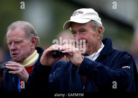 Golf - The 34th Ryder Cup Matches - The Belfry. George Bush Snr watches the second round play Stock Photo