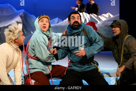 From left to right: Miltos Yerolemou as Snowy, Matthew Parish as Tintin, Stephen Finegold as Captain Haddock and Dai Tabuchi as Tharkey as the cast of Herge's Adventures of Tintin take part in a photocall at The Playhouse Theatre, London. Stock Photo