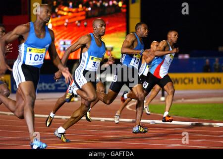 L-R: USA's Ramon Clay (109), Great Britain's Marlon Devonish (36), USA's Darvis Patton (121) and Great Britain's Dwayne Grant (42) in action during the 200m Stock Photo