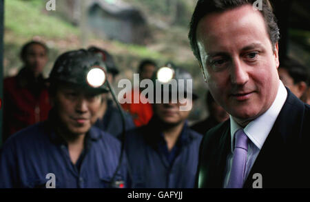 Leader of the Conservative Party, David Cameron meets miners at the Zhongliangshan Coal and gas company, Chongqing in China, on his last day of a 3 day visit to the country. Stock Photo