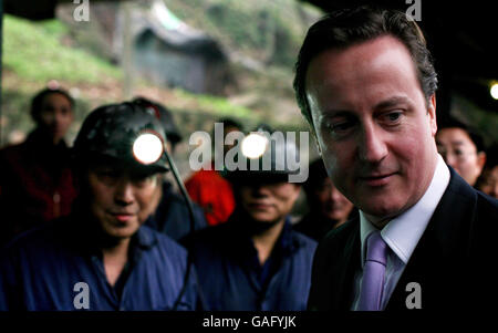 Leader of the Conservative Party, David Cameron meets miners at the Zhongliangshan Coal and gas company, Chongqing in China, on his last day of a 3 day visit to the country. Stock Photo