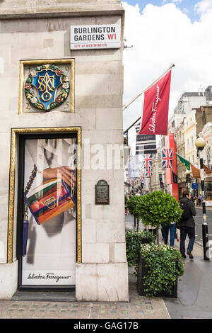 Street sign outside Salvatore Ferragamo in Burlington Gardens, London, W1 Stock Photo