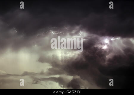 Cloudscape with lightning bolt hitting among the clouds Stock Photo