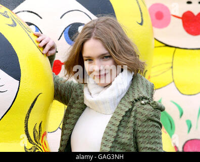 Five large-scale Russian nesting dolls, known as Matryoshka, are unveiled by London-based Russian supermodel Natalia Vodianova beside the British Airways London Eye, London. Stock Photo