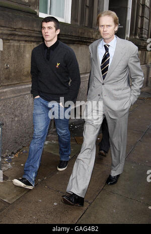 Newcastle United footballer Joey Barton, left, leaves Liverpool Magistrates Court where he answered assault and affray charges. Stock Photo