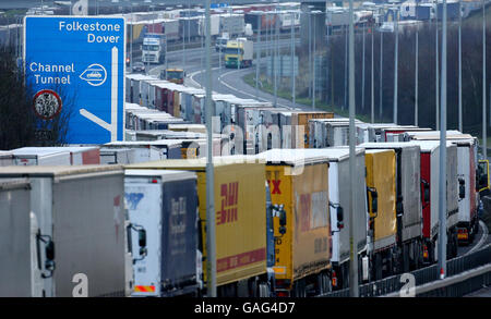 Lorries parked on the M20, near Folkestone in Kent, while Operation Stack remains in place as sailings from the Port of Dover are affected by French fisherman protesting in Calais. Stock Photo