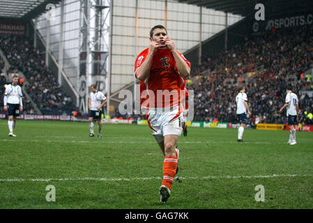 Blackpool's Wes Hoolahan celebrates scoring his penalty against Preston North End during the Coca-Cola League Championship match at Deepdale, Preston. Stock Photo