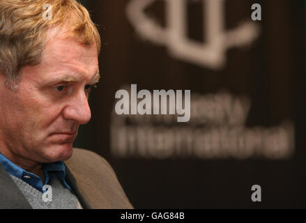 Poet Laureate Andrew Motion looks ahead during the book launch of 'Poems from Guantanamo: The Detainees Speak' at The Human Rights Action Centre in east London. Stock Photo