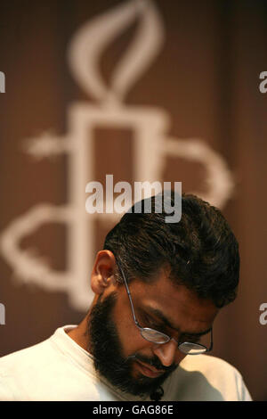 Former Guantanamo detainee and poet Moazzam Begg looks down during the book launch of 'Poems from Guantanamo: The Detainees Speak' at The Human Rights Action Centre in East London. Stock Photo